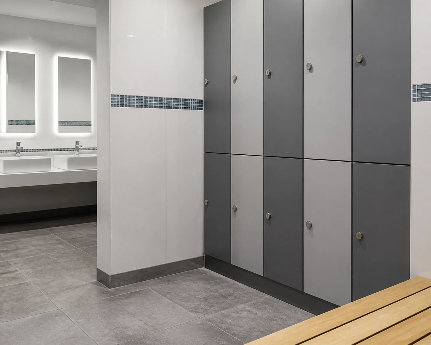 Durable easy-clean finishes in a modern commercial changing area.